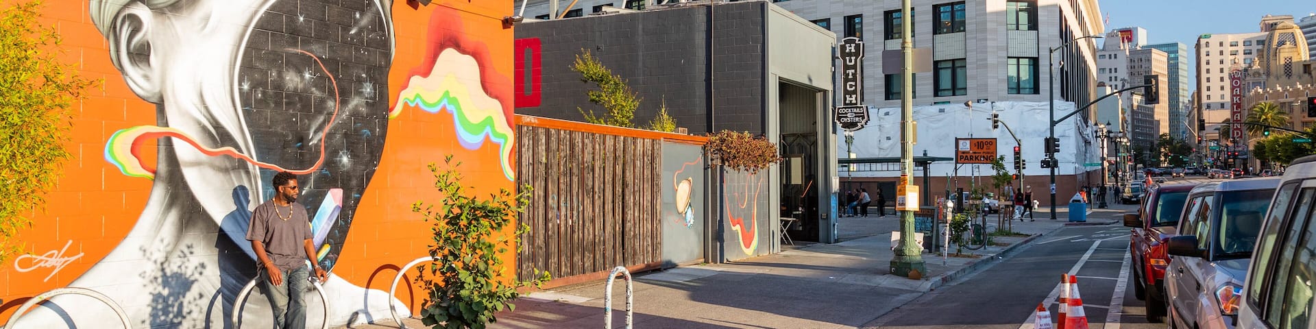 Telegraph Avenue featuring street scenes, outdoor art and a city