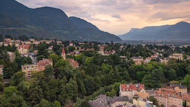 Merano featuring landscape views, a small town or village and a sunset