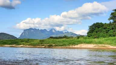 Views of the striking karst mountains in Laos are available from the slow boat from Thailand to Laos on the Mekong River.