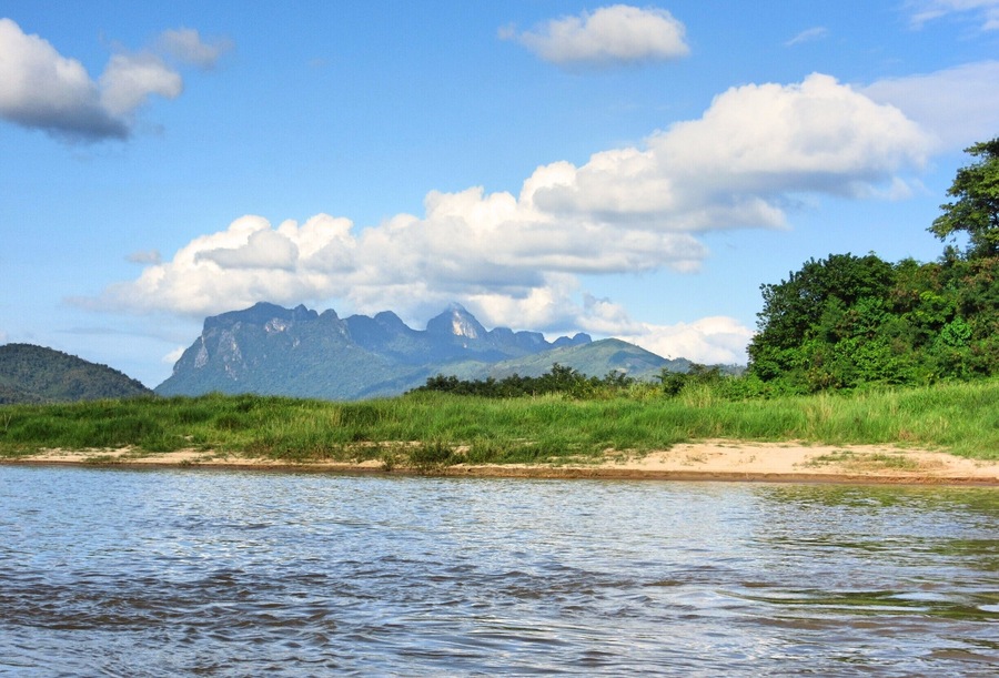 Views of the striking karst mountains in Laos are available from the slow boat from Thailand to Laos on the Mekong River.