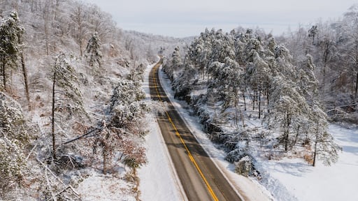 Aerial of KY Route 7 Surrounded by Snow Covered Forests - Grayson Lake State Park - Appalachian Mountains of Eastern Kentucky