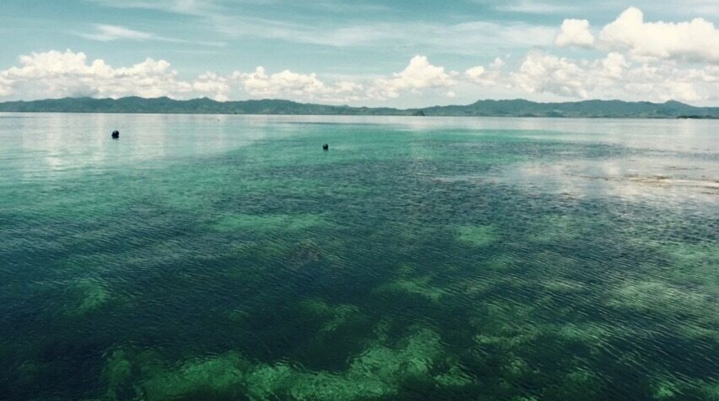 View from our water villa at El Nido Apulit Island Resort, Phillipines...don't know how but the sky always looks like this, clouds are on the horizon and sky will have shades of blue... Combined with pristine water is truly beautiful
