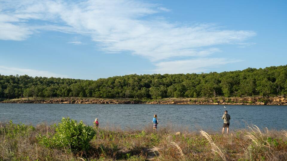 Family Fishes At Osage Point In Skiatook Lake, Oklahoma