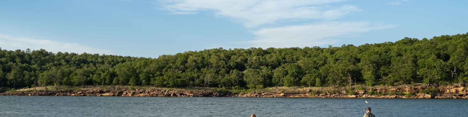 Family Fishes At Osage Point In Skiatook Lake, Oklahoma