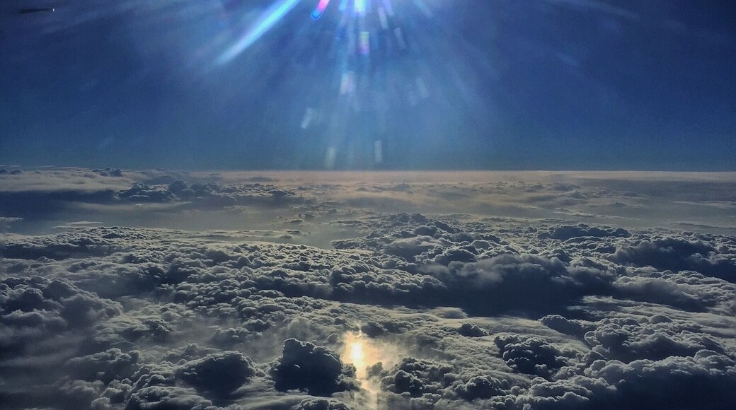 Enroute to Hong Kong on Cathay Pacific flight from ORD , the captain announces that we are 'just east of the North Pole'.....and soon the Iphone is identifying places such as 'Olekminskiy ulus' ...and 'Inner Mongolia' ....I wonder about what is below the clouds ....yurts and yaks and horsemen and ruddy cheeked kids ? Very dreamy 😎