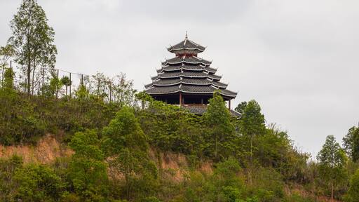 A pavilion in pagoda style of ancient Chinese architecture built on top of a hill