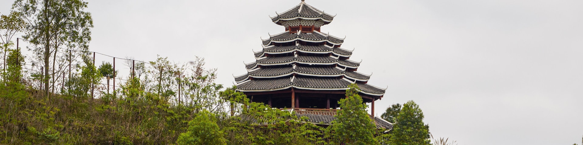 A pavilion in pagoda style of ancient Chinese architecture built on top of a hill
