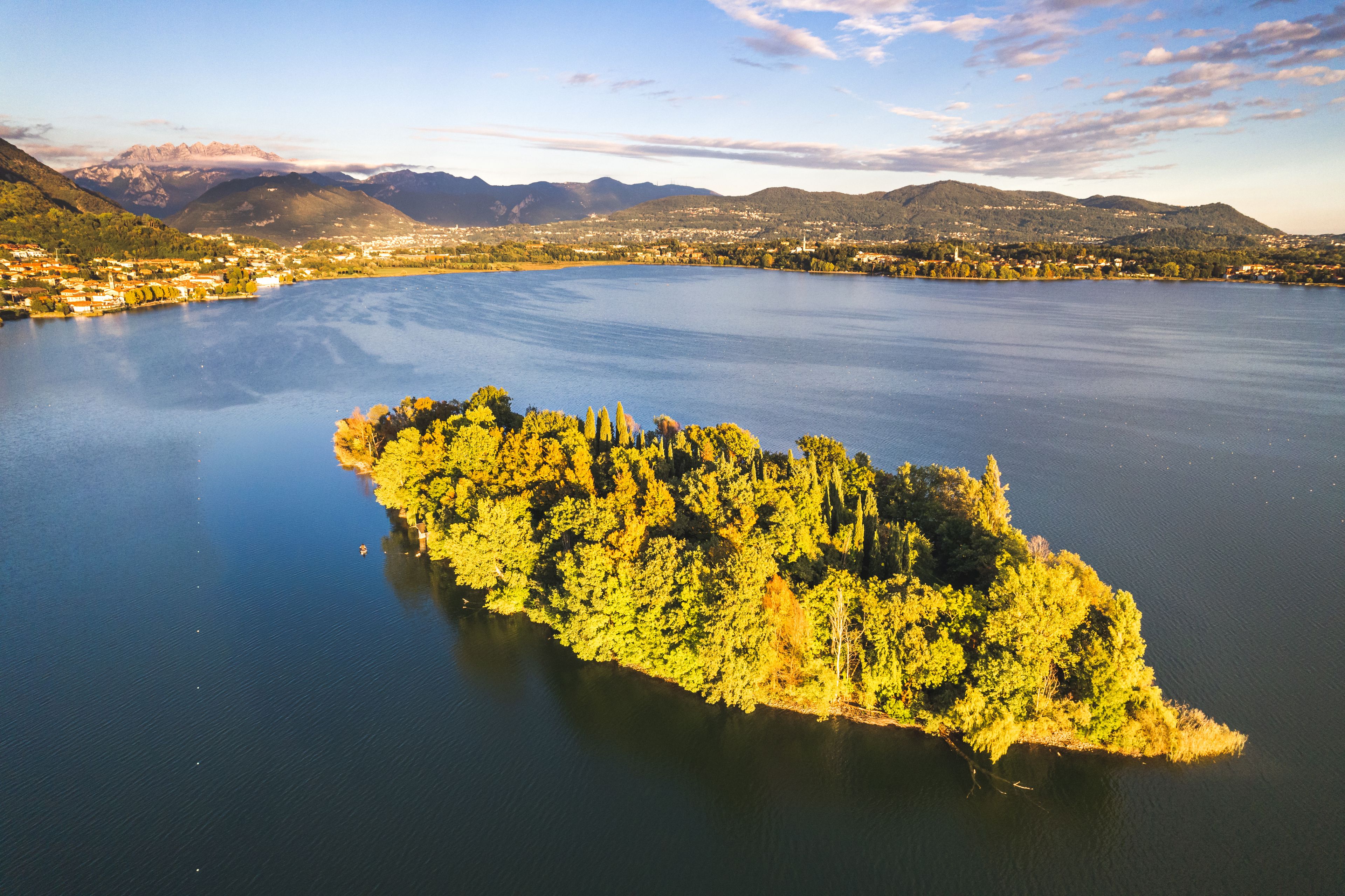 Aerial view of Pusiano Lake and Isola dei Cipressi, in Como, Lombardy, Italy