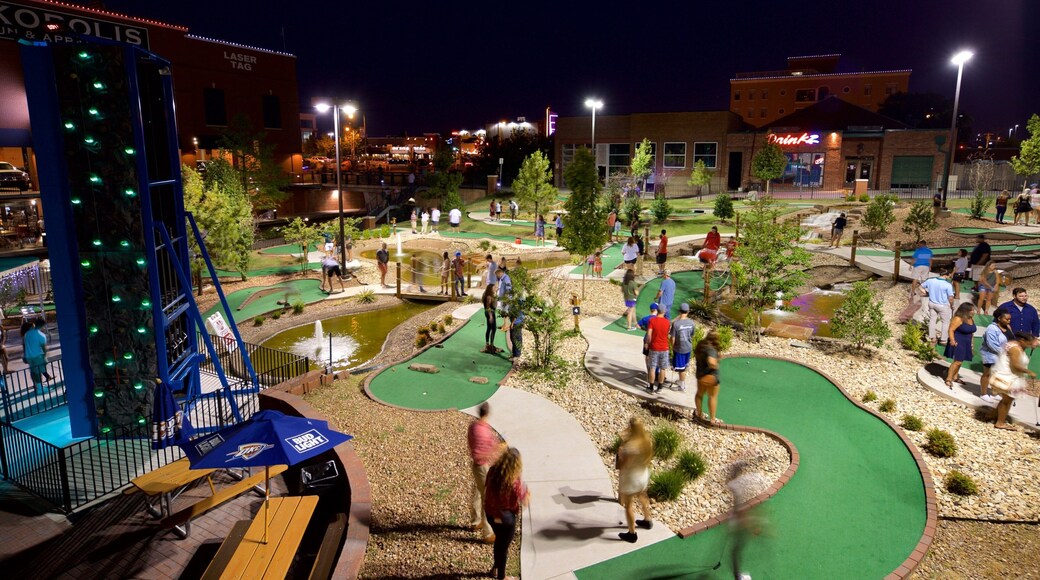 Bricktown which includes golf and night scenes as well as a small group of people