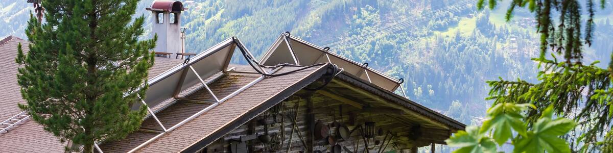 the beautiful wooden house in the mountains. view of a beautiful village in the mountains of the alps. Austria, Rohrberg