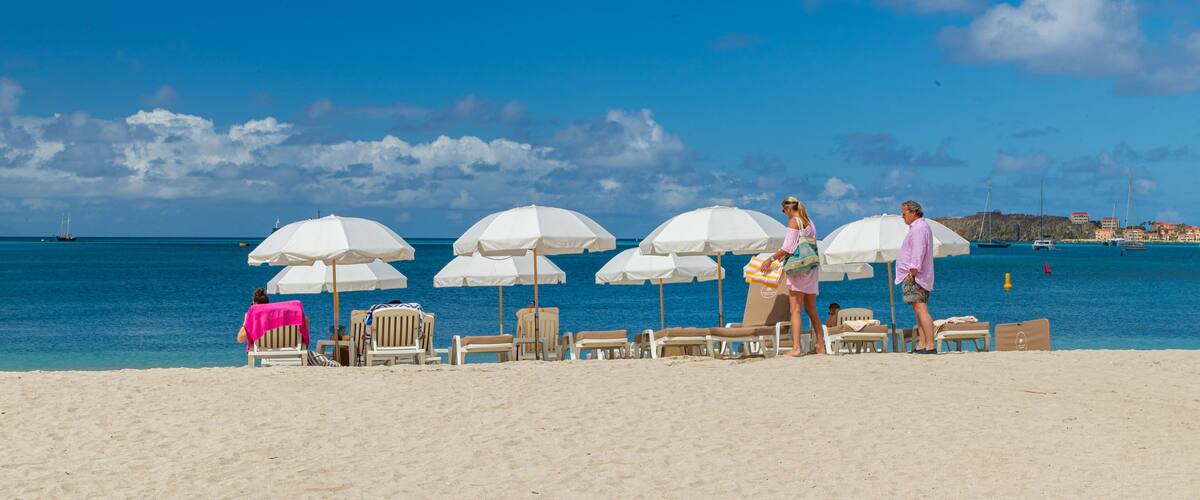 Great Bay Beach which includes general coastal views and a beach as well as a couple