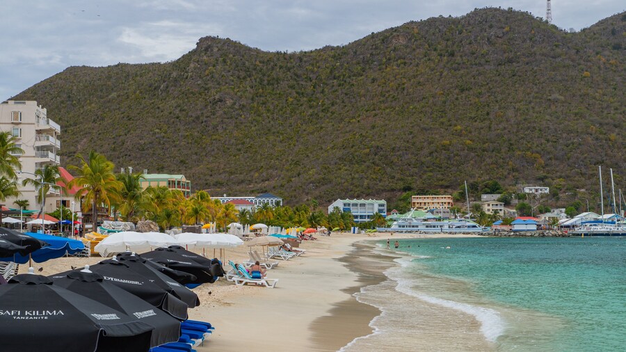 Great Bay Beach which includes a coastal town, a sandy beach and general coastal views