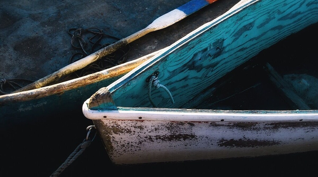 Dingys floating by the dock. At Rockport Massachusetts