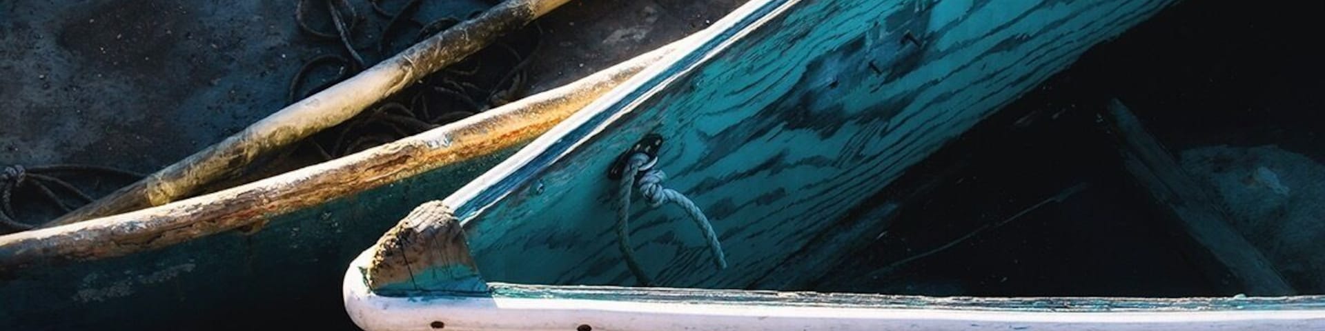 Dingys floating by the dock. At Rockport Massachusetts