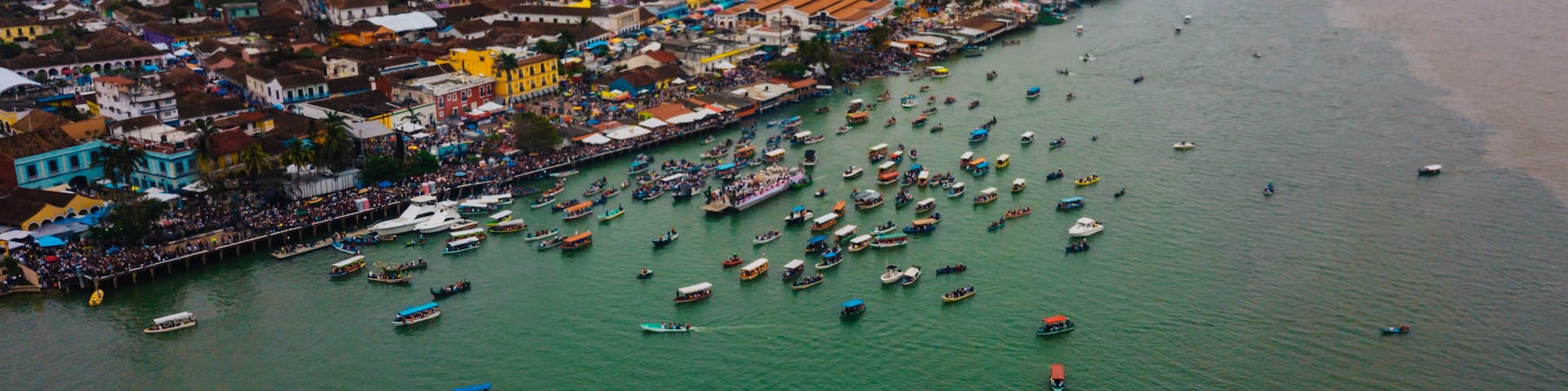 Aerial photo of many boats carrying the Virgen de la Candelaria in Tlacotalpan Veracruz, Mexico