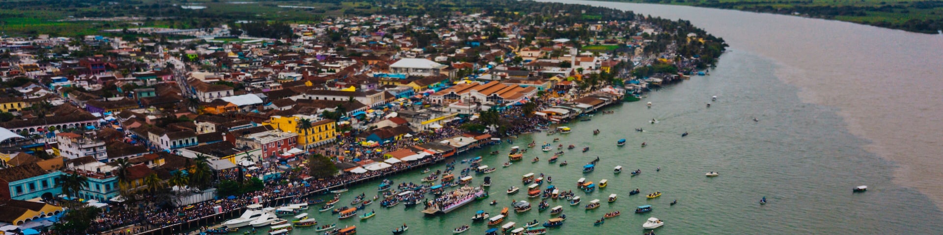 Aerial photo of many boats carrying the Virgen de la Candelaria in Tlacotalpan Veracruz, Mexico
