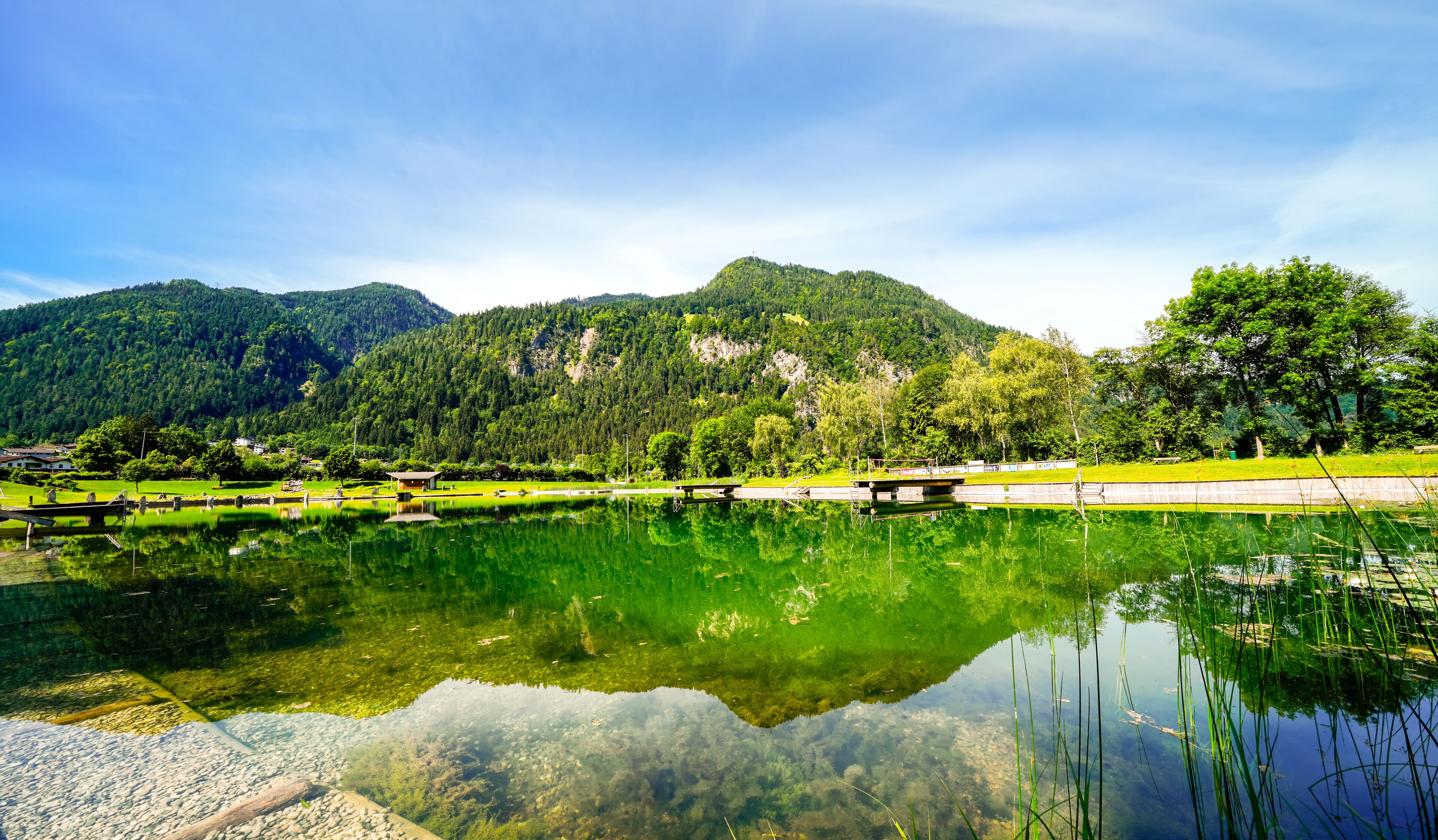 View of nature at Schlitterer See in the Zillertal. Idyllic landscape by the lake in Schlitters, Austria.

