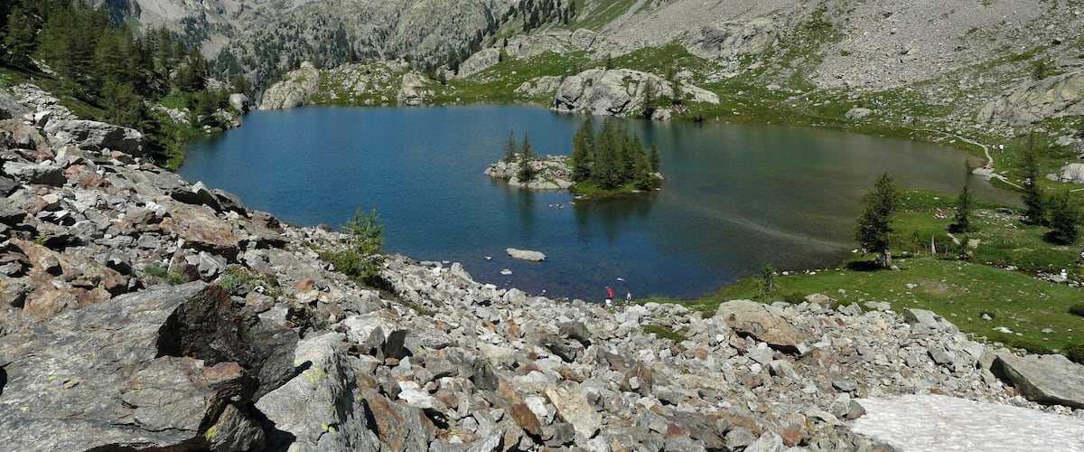 Trécolpas Lake and, in the background, Pélago mount (2768 m), caïres nègres du Pélago, cime de Baissette (2822 m) and tête de la ruine (2984 m) in Mercantour national park, Maritime Alps, France