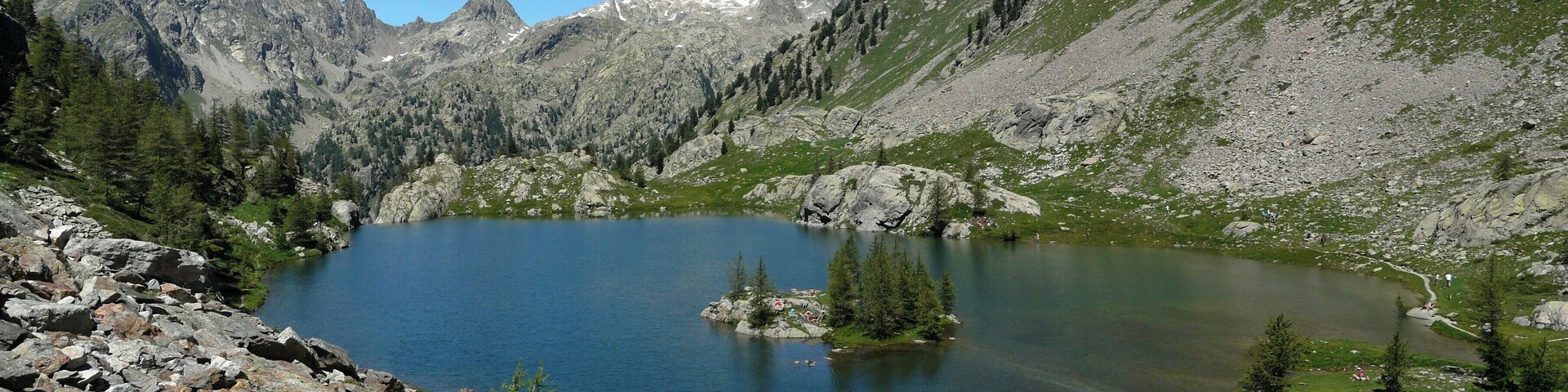 Trécolpas Lake and, in the background, Pélago mount (2768 m), caïres nègres du Pélago, cime de Baissette (2822 m) and tête de la ruine (2984 m) in Mercantour national park, Maritime Alps, France
