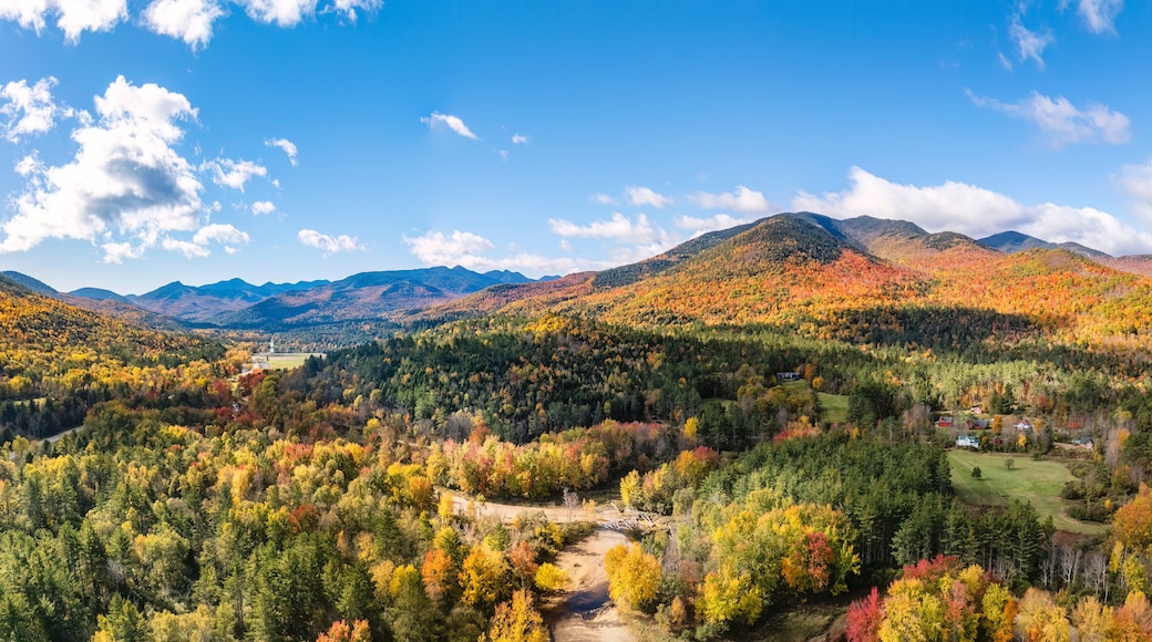Aerial view of the Adirondack Mountain Range and Ausable River in Keene Valley, New York during autumn.