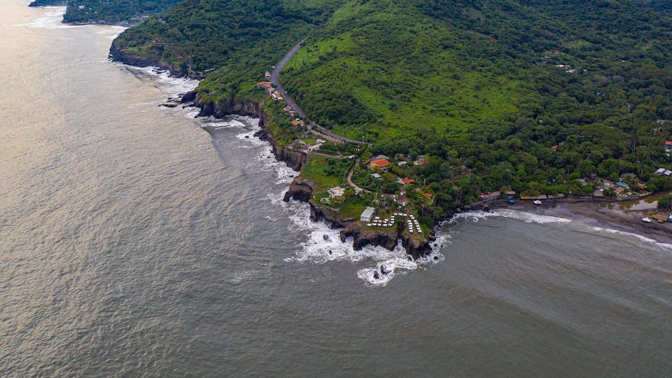 Aerial view of sea waves and fantastic Rocky coast, El Salvador