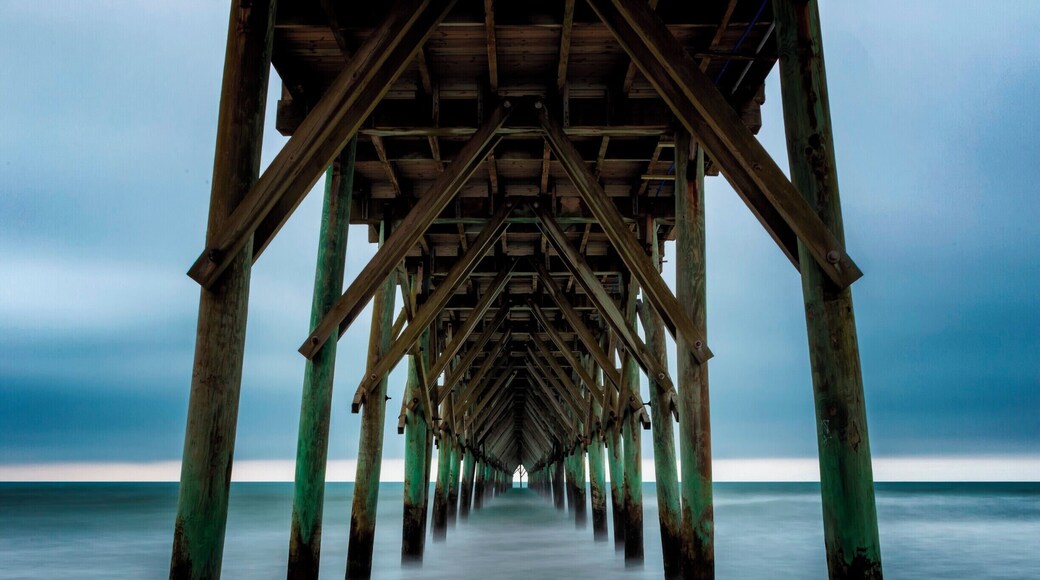 I may have uploaded a few from here. It's because I always love coming here right before sunrise and watching the waves come in. Today it was very calm. I was able to get a very dark mood with the rainclouds in the background.