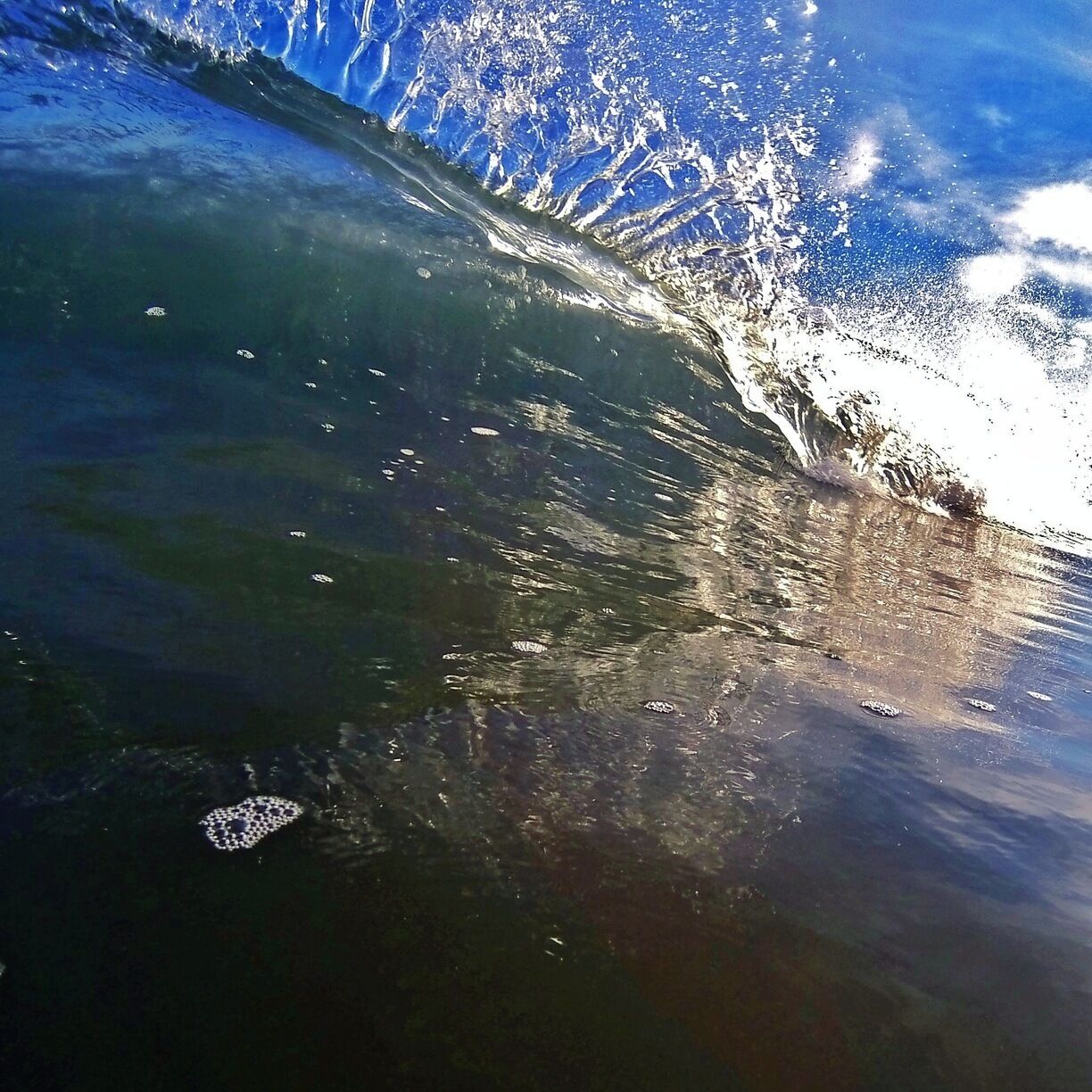 Going into a small wave. I think it was about 4 inches of water and a one foot wave.