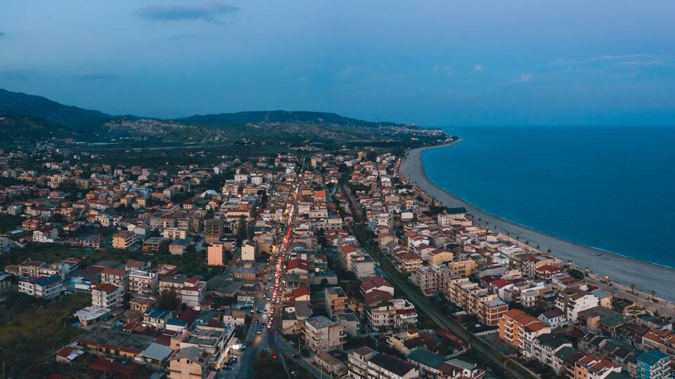 Aerial view of the city of Gioiosa by night. Calabria Italy