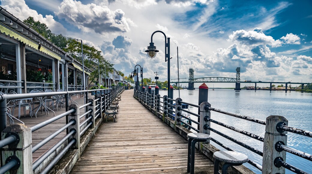 Riverwalk along the waterfront of the Cape Fear River overlooking Memorial Bridge Wilmington, NC
