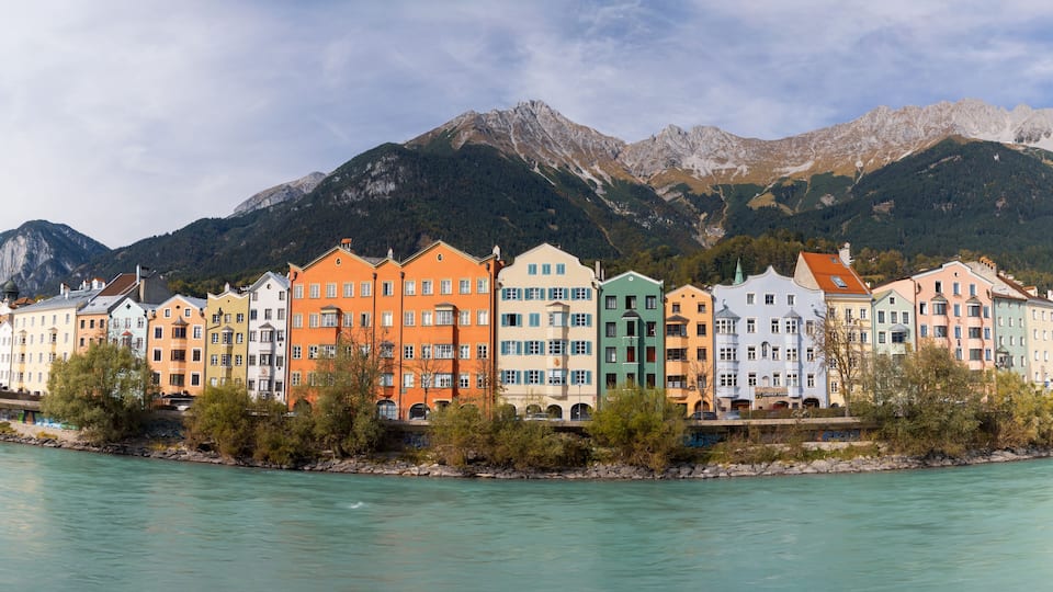 Panoramic view of colorful historic buildings in Innsbruck city, Austria.