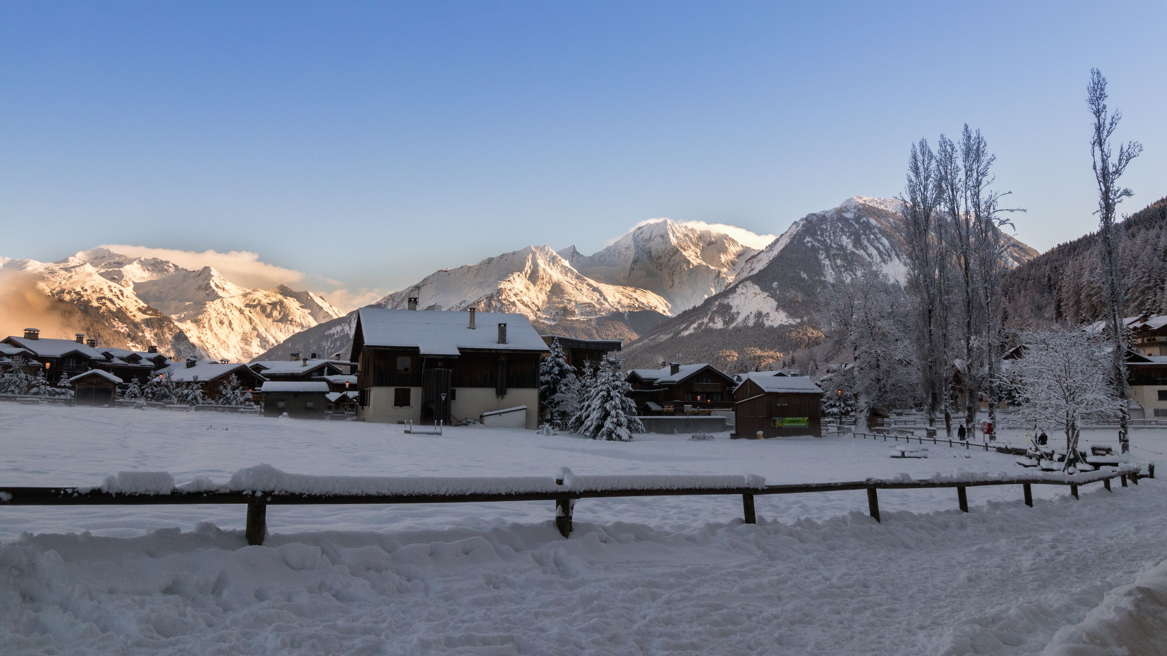 Courchevel Le Praz 1300 mt. Early Morning Sun Light Mountains
