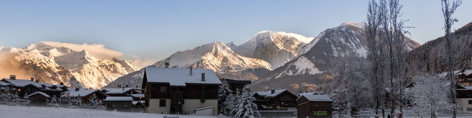 Courchevel Le Praz 1300 mt. Early Morning Sun Light Mountains