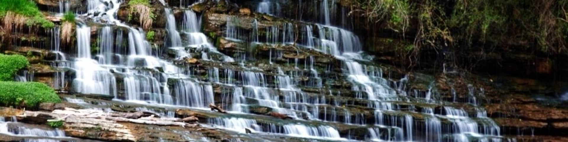 The main falls in rock island state park are a site to see. They stretch a few hundred feet wide! Slowly cascading down a side of a rock faced wall. It is a short but tenuous hike to see the falls. But, they are some of the best you can see in the south east. Maybe not the tallest or most water flowing, but it is a beautiful, slow, and pooling fall. As an added bonus the river it flows into is controlled by a dam, so you can at times get up to the waterfall, and at other times raft the river which I'm guessing is a class 3-4. A friend of mine has rafted it from the northern most spot to put in to the falls, and he said it was technical, he's done it a few times now.