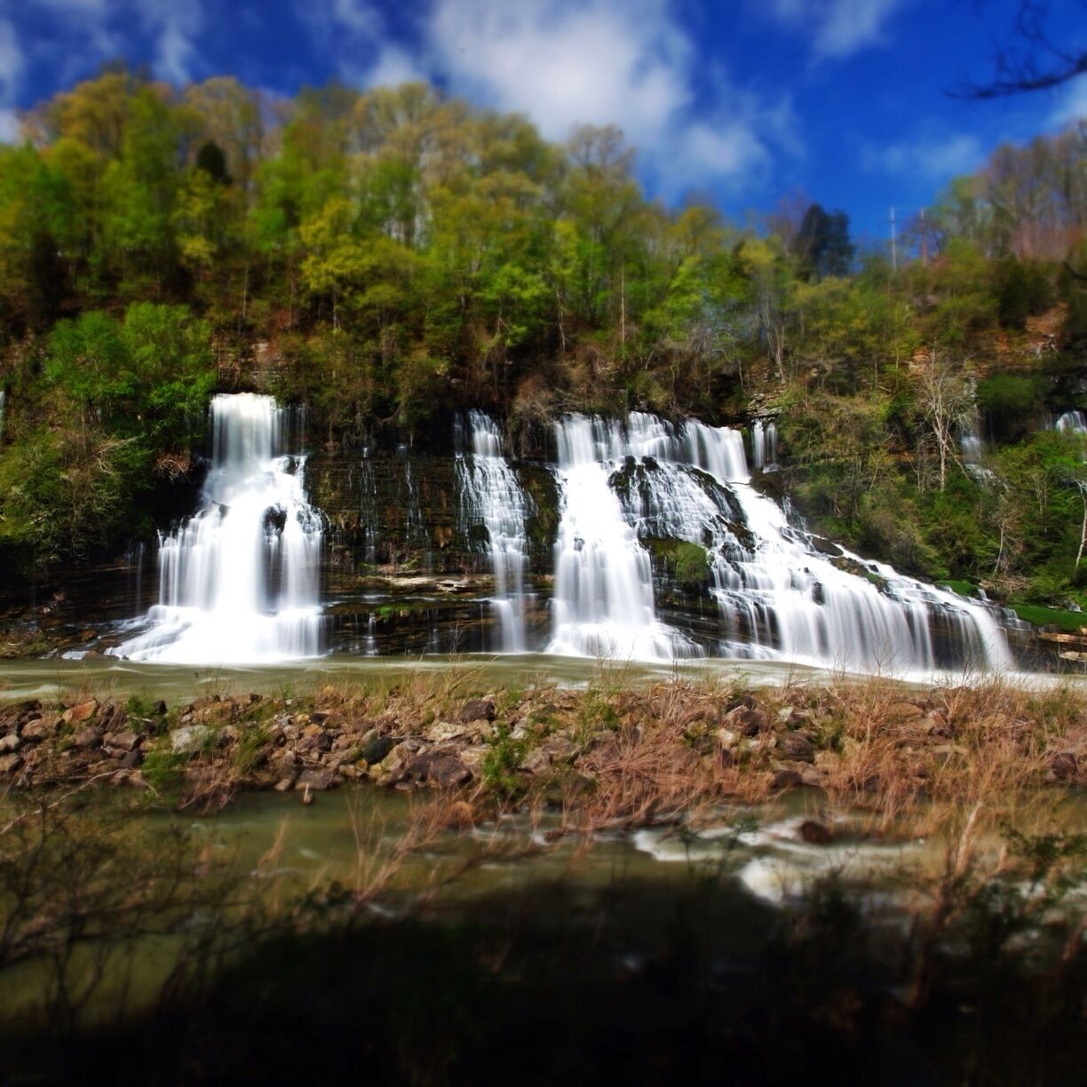 The main falls in rock island state park are a site to see. They stretch a few hundred feet wide! Slowly cascading down a side of a rock faced wall. It is a short but tenuous hike to see the falls. But, they are some of the best you can see in the south east. Maybe not the tallest or most water flowing, but it is a beautiful, slow, and pooling fall. As an added bonus the river it flows into is controlled by a dam, so you can at times get up to the waterfall, and at other times raft the river which I'm guessing is a class 3-4. A friend of mine has rafted it from the northern most spot to put in to the falls, and he said it was technical, he's done it a few times now. 