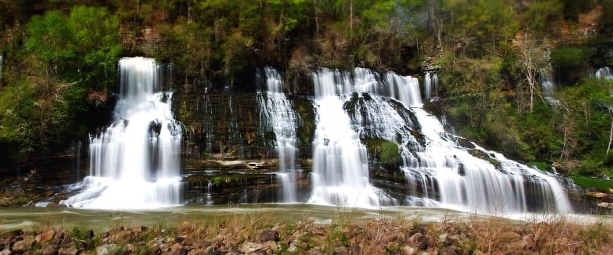 The main falls in rock island state park are a site to see. They stretch a few hundred feet wide! Slowly cascading down a side of a rock faced wall. It is a short but tenuous hike to see the falls. But, they are some of the best you can see in the south east. Maybe not the tallest or most water flowing, but it is a beautiful, slow, and pooling fall. As an added bonus the river it flows into is controlled by a dam, so you can at times get up to the waterfall, and at other times raft the river which I'm guessing is a class 3-4. A friend of mine has rafted it from the northern most spot to put in to the falls, and he said it was technical, he's done it a few times now.