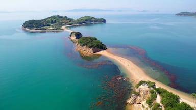 Aerial view of the Angel Road under blue sunny sky, a tidal sandbar connecting 3 beautiful offshore islets to Shodoshima Island in Seto Inland Sea and a tourist attraction in Tonosho, Kagawa, japan