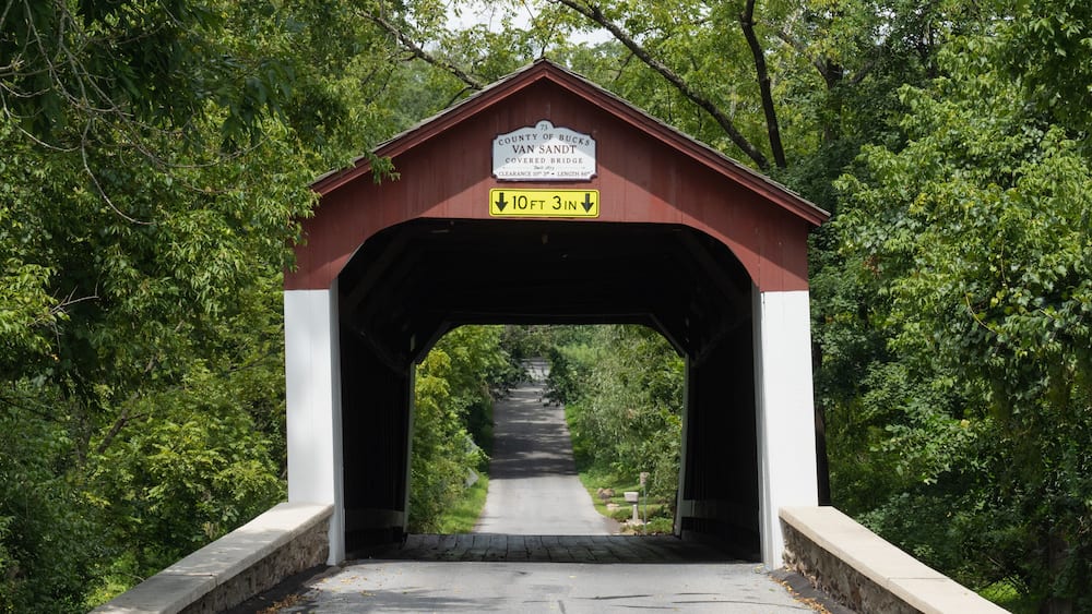 Historic Van Sandt covered bridge, also known as the Beaver Dam Bridge is a Town truss bridge, built with overlapping and connected triangles that distribute weight equally over the length.
