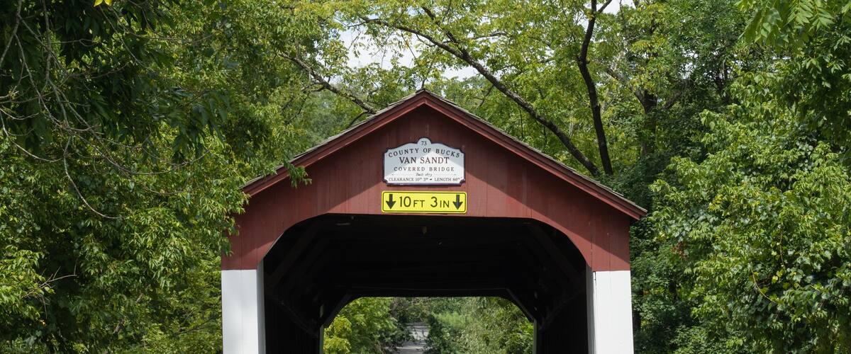 Historic Van Sandt covered bridge, also known as the Beaver Dam Bridge is a Town truss bridge, built with overlapping and connected triangles that distribute weight equally over the length.