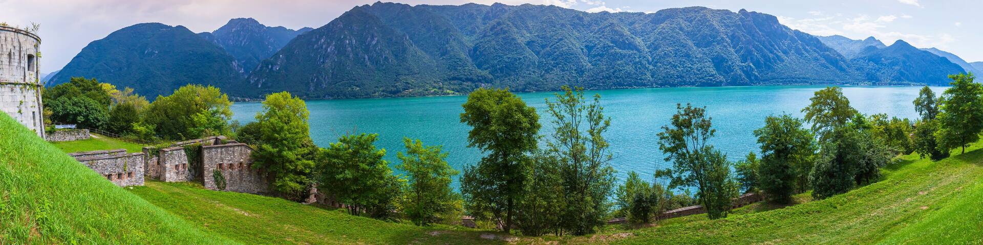 Sightseeing at the beautiful landscape of lake Idro Rocca d'Anfo Italy, ruins of a old bunker panorama.