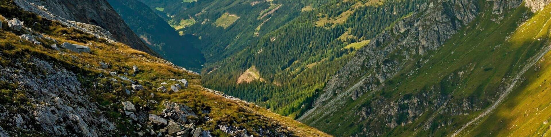 August 2011
Hoher Dachstein massif, Austria
View of the massif of Hoher Dachstein from south through Preunegg pass on the way to Giglachsee lakes in Schladminger Tauern.
Dachstein is a mighty karstic limestone range of ca. 20x30 km belonging to Northern Limestone Alps and has dozens of peaks higher than 2.500 metres. From south it has a prominence of more than 2.000 meters and descends steeply to valley of river Enns with city of Schladming. On its north side there are the most northern and most eastern glaciers of Alps. The top summit of Hoher Dachstein has altitude of 2.995 metres.