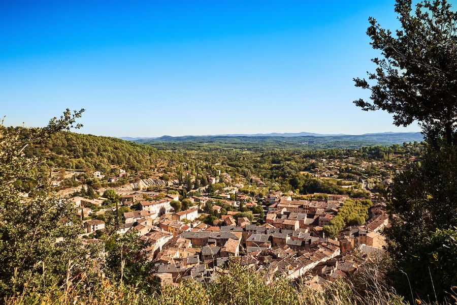 Sunny overview of the beautiful Provencal village Cotignac ; Shutterstock ID 795799738; purchase_order: SP-1332 HA Batch 2 August 2018; Order: ; client: HomeAway; other: To be pa