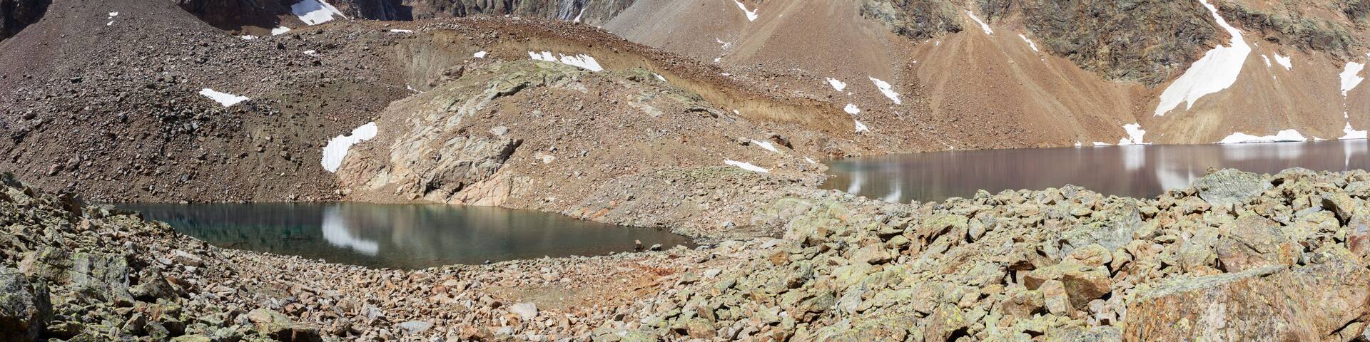 Hiking trail in Valpelline, Aosta, Italy. Panorama of Lac Mort at 2850 meters of altitude.