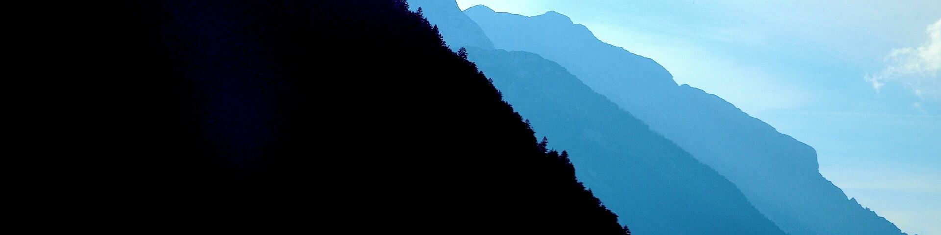 It's really a treat to see these view of alpine mountains from the countryside. I like the way the light contrasts between the three. #endlesssummer #mountains