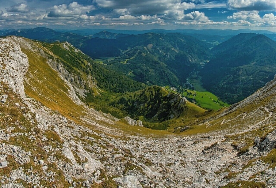 September 2016
Seewiesen, Hochschwab, Steiermark, Austria 
This is the view from Afflenzer Staritzen towards Seewiesen village and Seegraben valley.  Afflenzer Staritzen range is part of the Hochschwab range in Austria and rise up to 2.000 m altitude. Seewiesen is a tiny village (alt. 974 meters) on the east end of Hochschwab and it is an ideal starting or ending point for hiking in the Hochschwab mountains.
