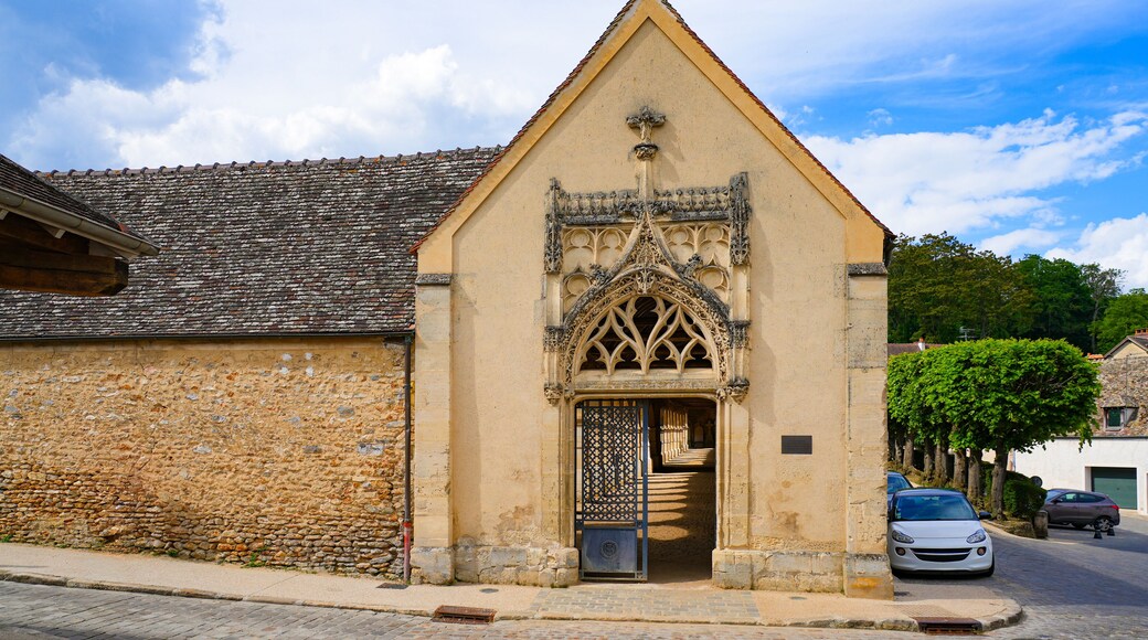 Gothic portal of the cemetery of Montfort-l'Amaury, a rural village of the French department of Yvelines in Paris region