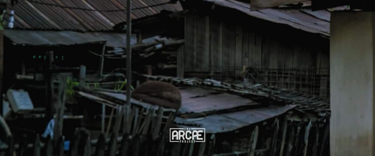 A golden temple rises over the slums of Hsipaw, Myanmar.