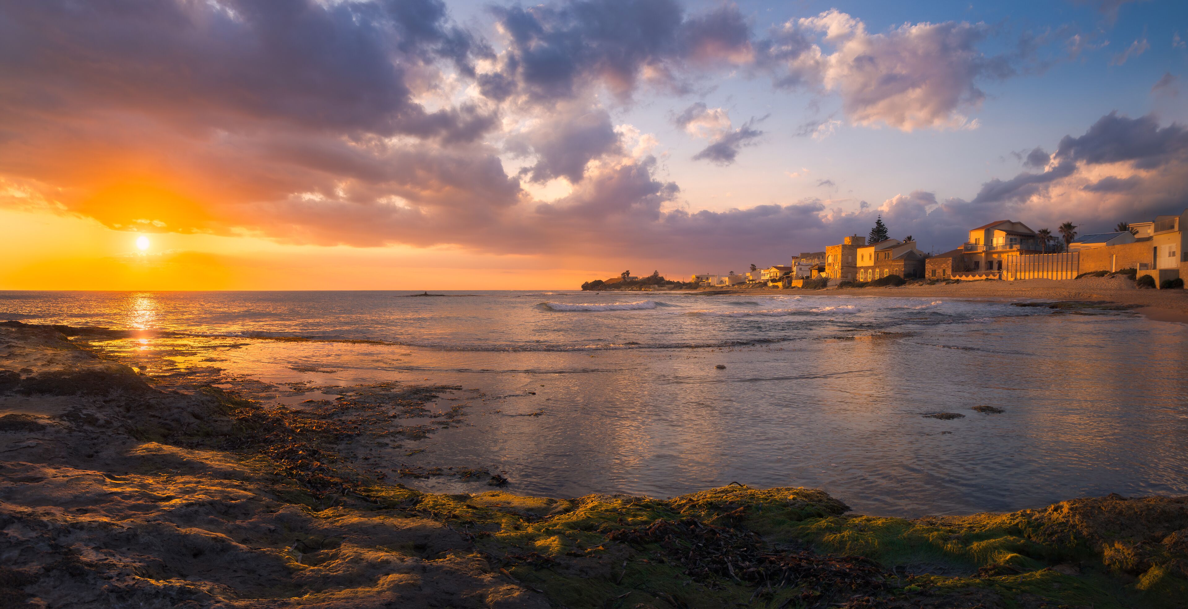 Vibrant Golden Sunset Over Punta Secca's Serene Sicilian Coast, Italia