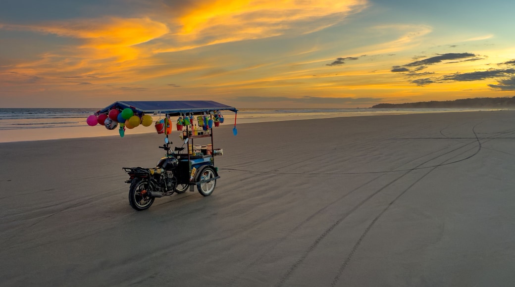 Colorful Vendor Cart on Beach at Sunset