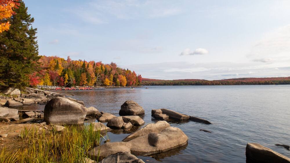 Autumnal view of a peaceful lake in the Frontenac national park, Canada