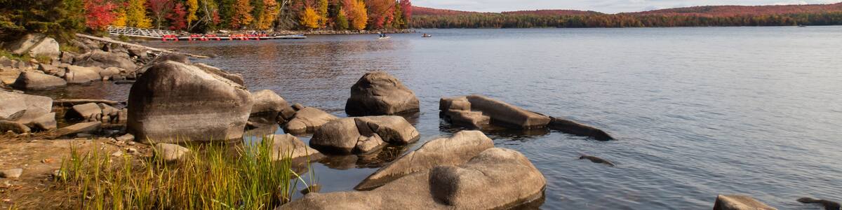 Autumnal view of a peaceful lake in the Frontenac national park, Canada